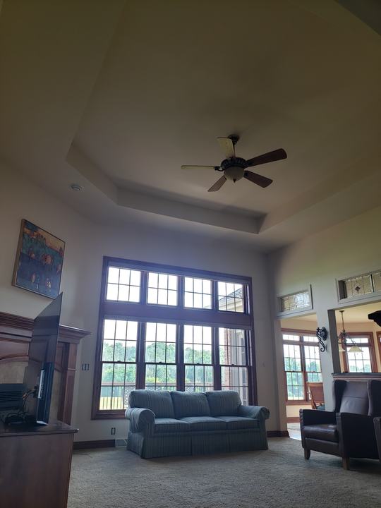 Great room with a tray ceiling
